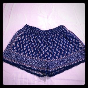 Adorable blue shorts with cute leg trim.